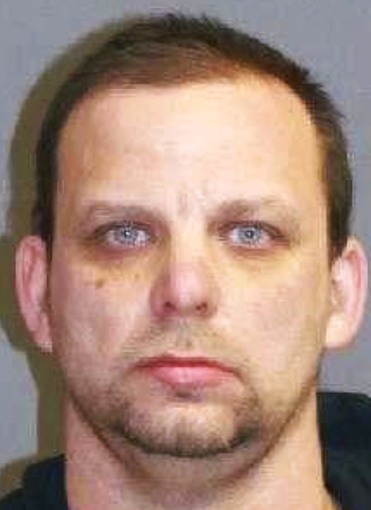 This undated booking photo provided on the U.S. Marshals website shows Ron Duby Jr., who had been wanted by New Hampshire authorities for failing to register as a sex offender.
