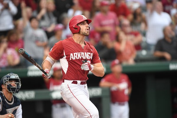 Arkansas' Chad Spanberger watches his 20th home run of the season clear the fence in the seventh inning against Oral Roberts Saturday June 4, 2017 during the NCAA Fayetteville Regional at Baum Stadium. Arkansas won 4-3.