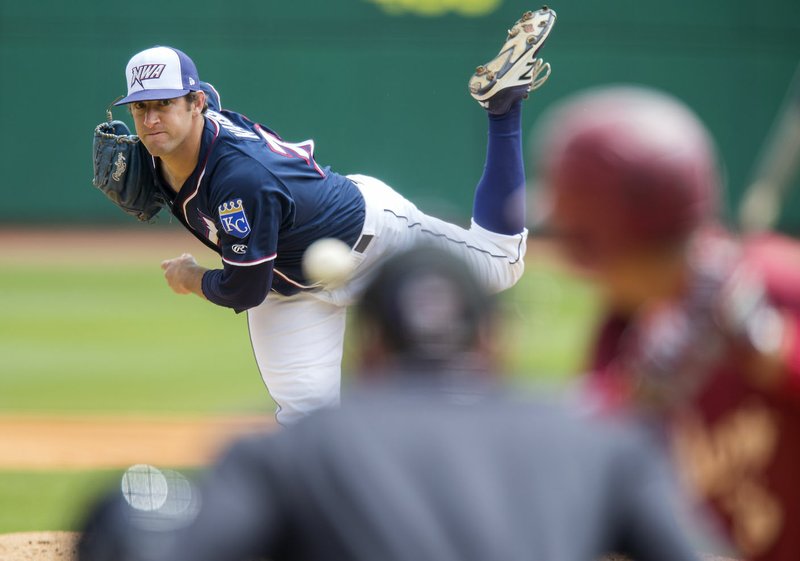 Northwest Arkansas Naturals pitcher Jake Kalish delivers a pitch against the Frisco RoughRiders on May 24 at Arvest Ballpark in Springdale.