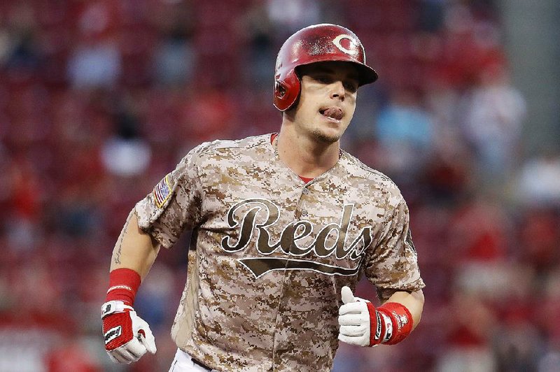 Cincinnati left fielder Scooter Gennett on Tuesday became the first major league player to have 5 hits, 4 home runs and 10 RBI in a game during the Reds’ 13-1 blowout victory over National League Central Division rival St. Louis.