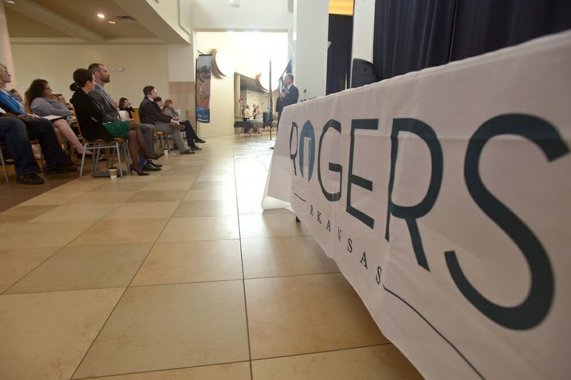 J.R. Shaw, executive director of Visit Rogers, speaks Friday, March 24, 2017, during a discussion hosted by Visit Rogers at Pinnacle Hills Promenade for area businesses to learn about trends and forecasts in the travel and tourism industry. 