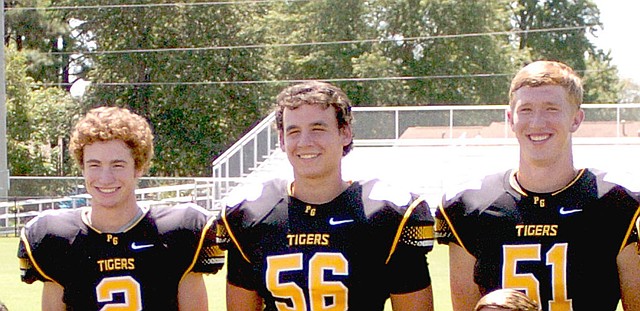 MARK HUMPHREY ENTERPRISE-LEADER/Prairie Grove 2017 graduates (from left): Isaac Disney, Dawson West and Jack Stone, have accepted college scholarships to play football. The trio were part of a 2016 Tiger team that went 12-1 and advanced to the 4A State semifinals for the second year in-a-row.