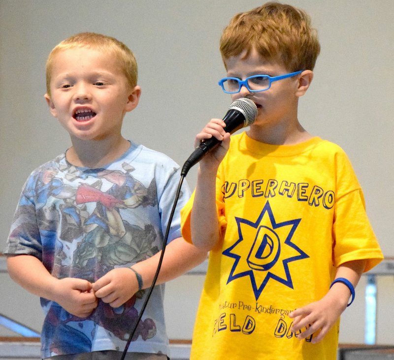 Photo by Mike Eckels One of the highlights of the Decatur Pre-K celebration was a performance of the 1983 hit song by Elton John, &#8220;I&#8217;m Still Standing,&#8221; by duo Peyton McCraw (right) and Brayden Neighbors in the cafeteria of Northside Elementary May 22.