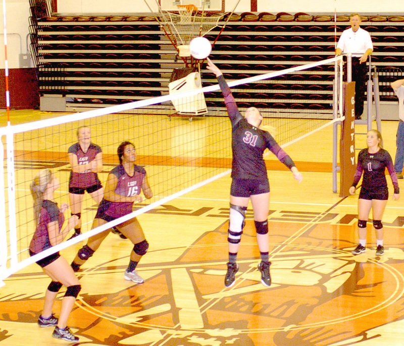 MARK HUMPHREY ENTERPRISE-LEADER/Lincoln 2017 graduate Kendra Cummings, shown competing against Gentry, earned All-State honors in volleyball.