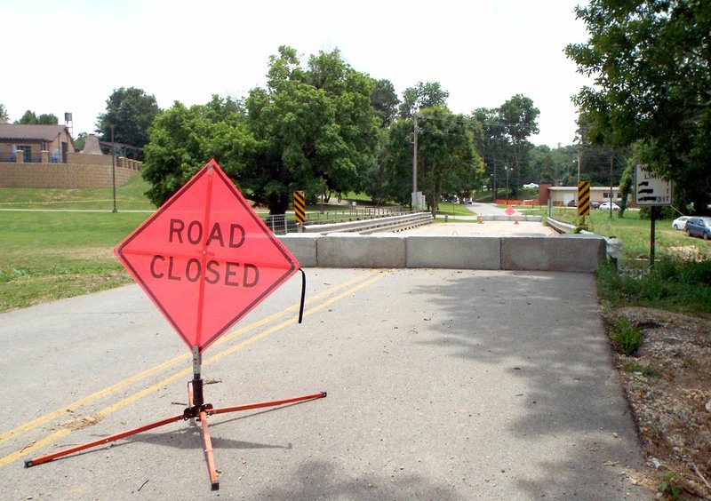 Photo by Randy Moll The bridge over Flint Creek suffered damage in the late-April flood and remains closed until it can be repaired and made safe again.