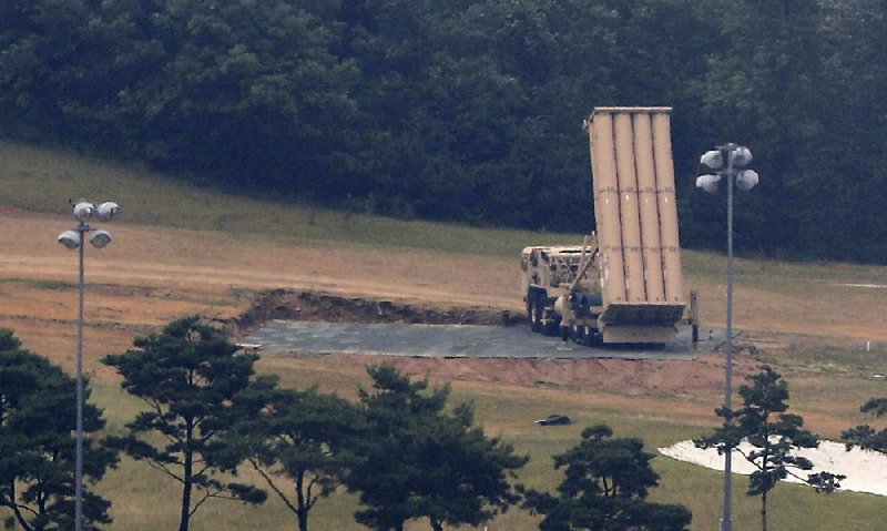 A South Korean official said Wednesday that the two launchers installed for a missile-defense system, including this one in Seongju, can remain in place but that deployment of the other four launchers is on hold.  