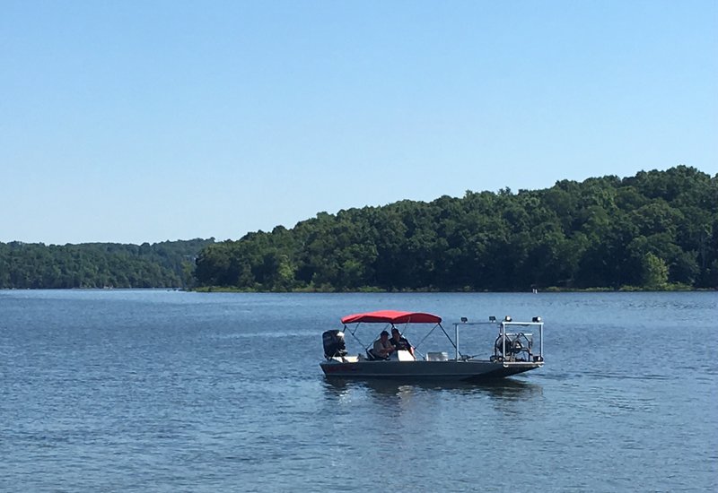 Officials patrol Beaver Lake Friday, June 9, 2017.