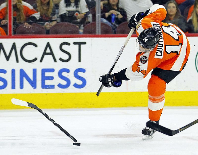 Philadelphia center Sean Couturier breaks his stick while taking a shot during a game against Carolina earlier this season. Broken hockey sticks remain a common occurrence in the NHL despite the technological advancements that have been designed to keep them together.