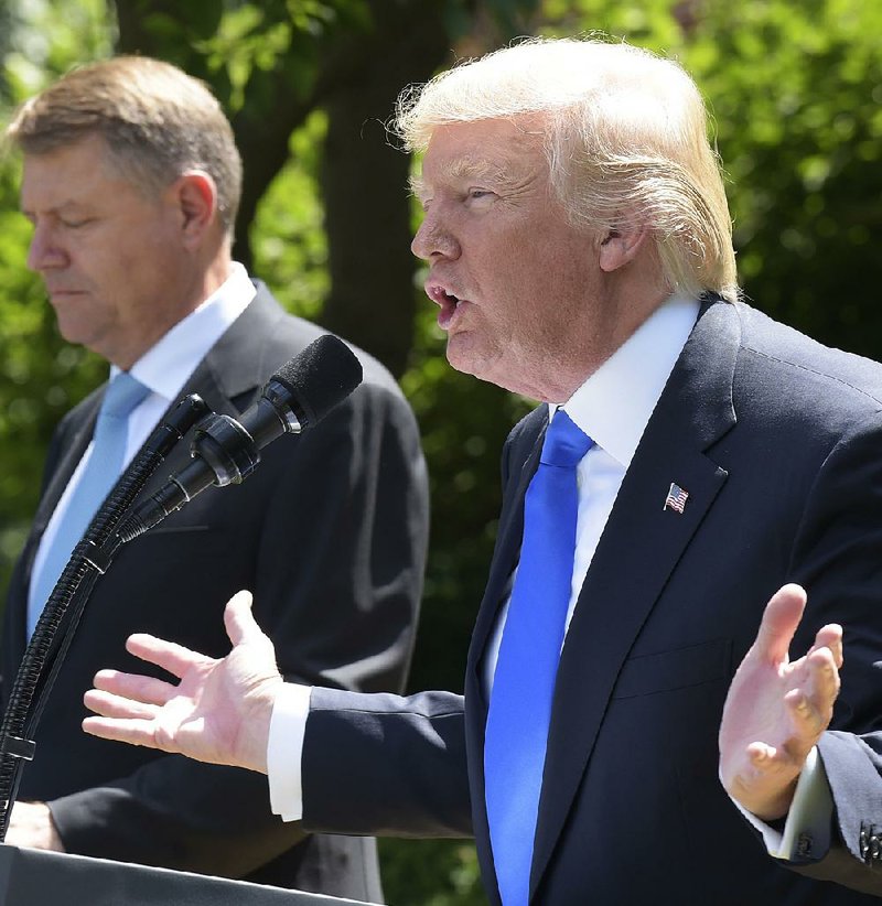 President Donald Trump, in a White House Rose Garden appearance Friday with Romanian President Klaus Iohannis, denied asking former FBI Director James Comey to drop the investigation of Michael Flynn. “I didn’t say that,” Trump said. “And there’d be nothing wrong if I did say it.”