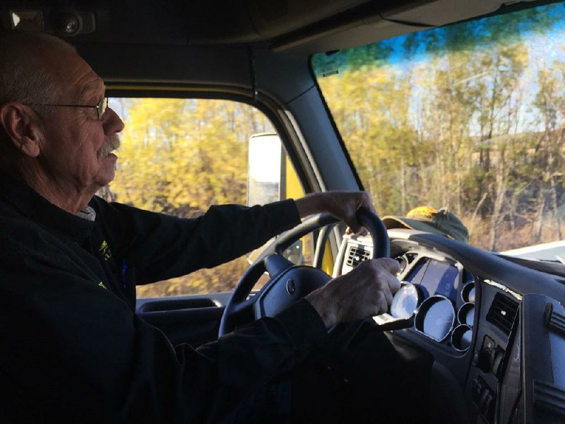 Driver Jerry Whittenburg is able to keep both hands on the wheel since he switched to an automated transmission. For more than four decades, Whittenburg drove a manual-transmission truck.