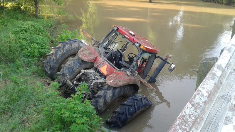 The Prairie County sheriff's office said one of the two tractors had been driven into a creek. 