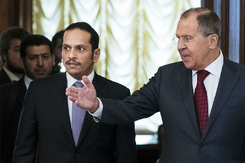 Qatari Foreign Minister Sheikh Mohammed bin Abdulrahman Al Thani meets with Russian counterpart Sergey Lavrov on Saturday in Moscow. Lavrov said Russia will make every effort to help ease the conflict between Qatar and Arab countries that have severed ties with the Persian Gulf nation.