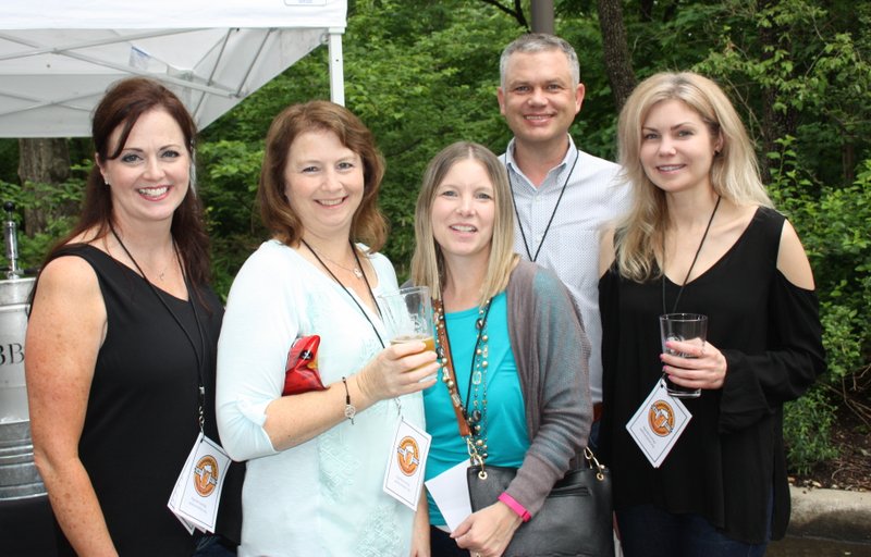 Colleen Hendren (from left), Tracey Hodge, Lisa Heilman, Ross Carver and Kim McKay enjoy Gardens on Tap on May 20 at Compton Gardens and Conference Center in Bentonville.