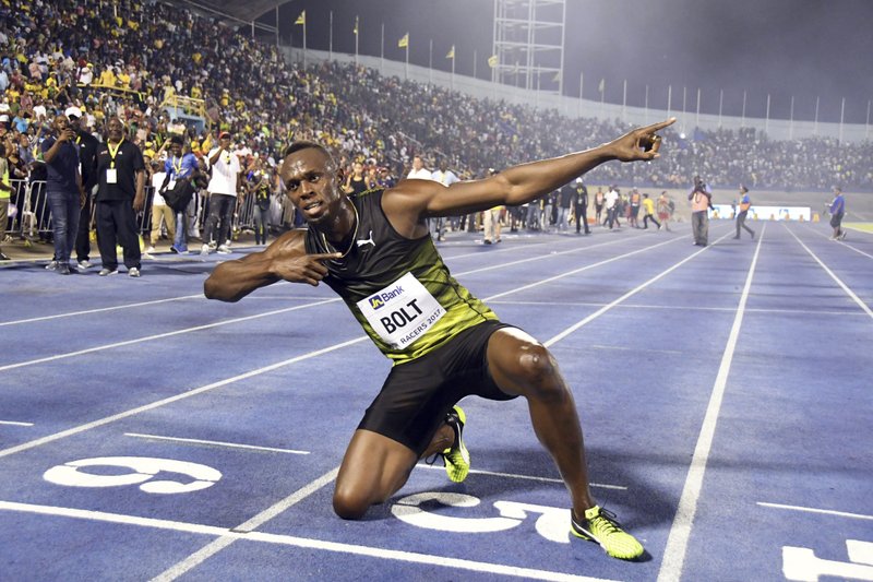 Jamaica's Usain Bolt celebrates after winning the &quot;Salute to a Legend &quot; 100 meters during the Racers Grand Prix at the national stadium in Kingston, Jamaica, Saturday, June 10, 2017. Bolt started his final season with his last race on Jamaican soil and plans to retire from track and field after the 2017 London World Championships in August. (AP Photo/Bryan Cummings)