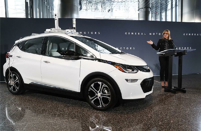 General Motors CEO Mary Barra unveils a Chevrolet Bolt electric car in Detroit in December. GM said Tuesday that it built 130 selfdriving Bolts at its Orion Assembly Plant in Orion Township, Mich. 