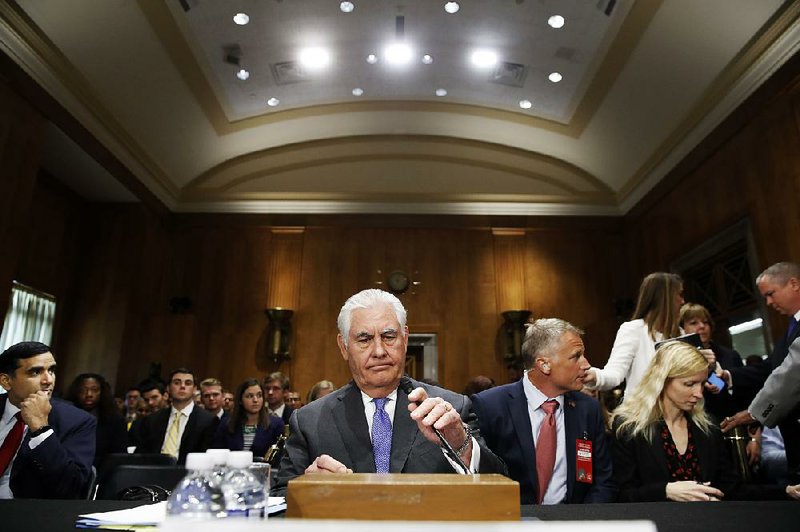 Secretary of State Rex Tillerson takes his seat Tuesday on Capitol Hill to testify before the Senate Foreign Relations Committee.