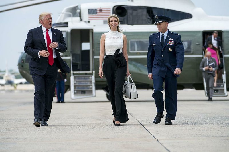 President Donald Trump and his daughter Ivanka leave Marine One as they prepare to board Air Force One for a !ight to a jobs event Tuesday in Wisconsin.