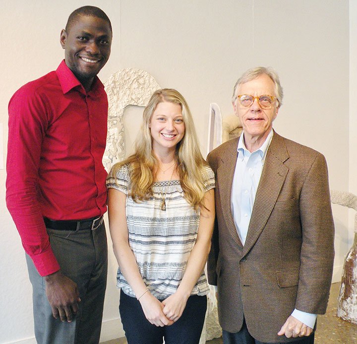 Making plans for the Monday meeting on the progress of The Wisdom House Project are Darlynton Adegor, left, a lawyer from Nigeria who is studying at the University of Arkansas Clinton School of Public Service; Natalie Larrison, director of outreach for the Syrian Emergency Task Force; and Jerry Adams, a Conway businessman and chairman of the steering committee for The Wisdom House Project. The public is invited to the meeting at 7 p.m. June 19 at UCA Downtown in Conway to hear an update on the local project that is providing support for orphans in Idlib province, Syria.