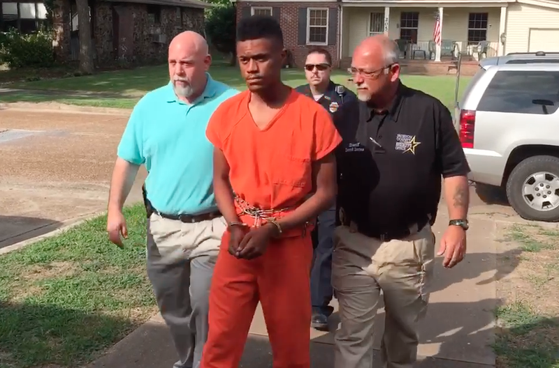 Tyler Calamese is escorted into court Wednesday morning.
