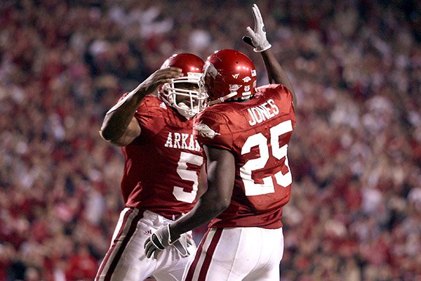 Arkansas running backs Darren McFadden (5) and Felix Jones (25) celebrate during a game against South Carolina on Saturday, Nov. 3, 2007, in Fayetteville. 