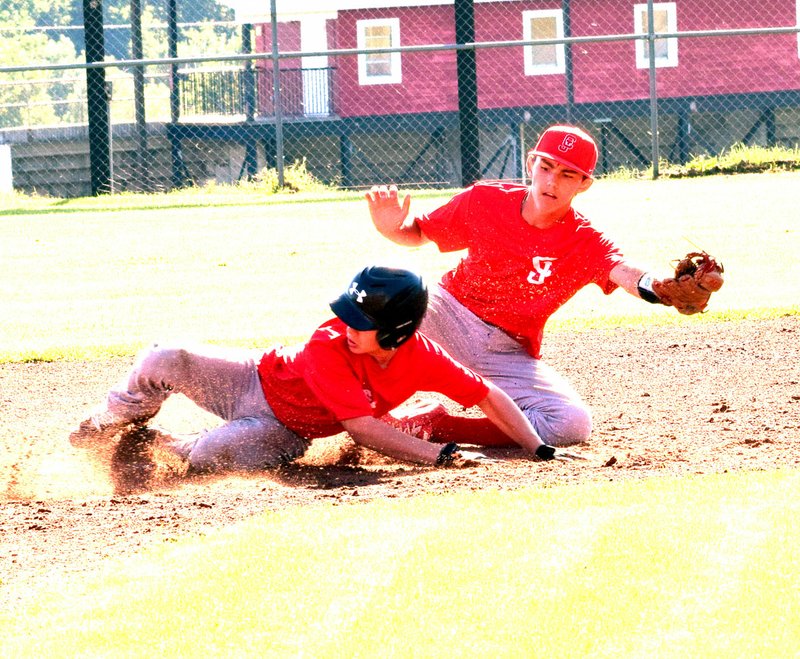 Photo by Rick Peck McDonald County&#8217;s Sampson Boles gets tagged out while attempting to steal second base during McDonald County&#8217;s 12-2 loss on June 6 at McDonald County High School.