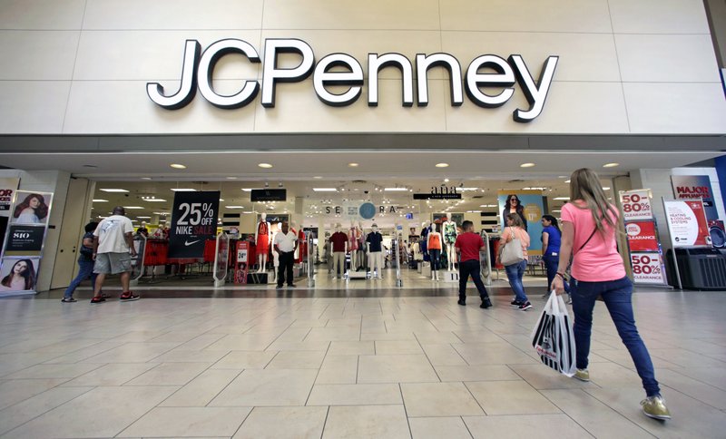 In this Wednesday, June 7, 2017, photo, shoppers walk into a J.C. Penney department store in Hialeah, Fla.  (AP Photo/Alan Diaz)