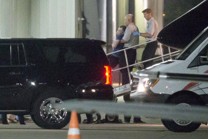 Otto Warmbier, a 22-year-old college student detained and imprisoned in North Korea, is carried off of an airplane at Lunken Airport in Cincinnati on Tuesday, June 13, 2017. Warmbier arrived in Ohio after being released by North Korea, where he was serving a 15-year prison term with hard labor for alleged anti-state acts. His parents have said he has been in a coma and was medically evacuated. (Sam Greene/The Cincinnati Enquirer via AP)