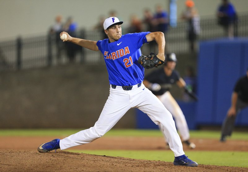 Florida pitcher Alex Faedo (21) throws in relief in the eighth inning of an NCAA college super regional baseball game against Wake Forest on Monday, June 12, 2017, in Gainesville, Fla. 