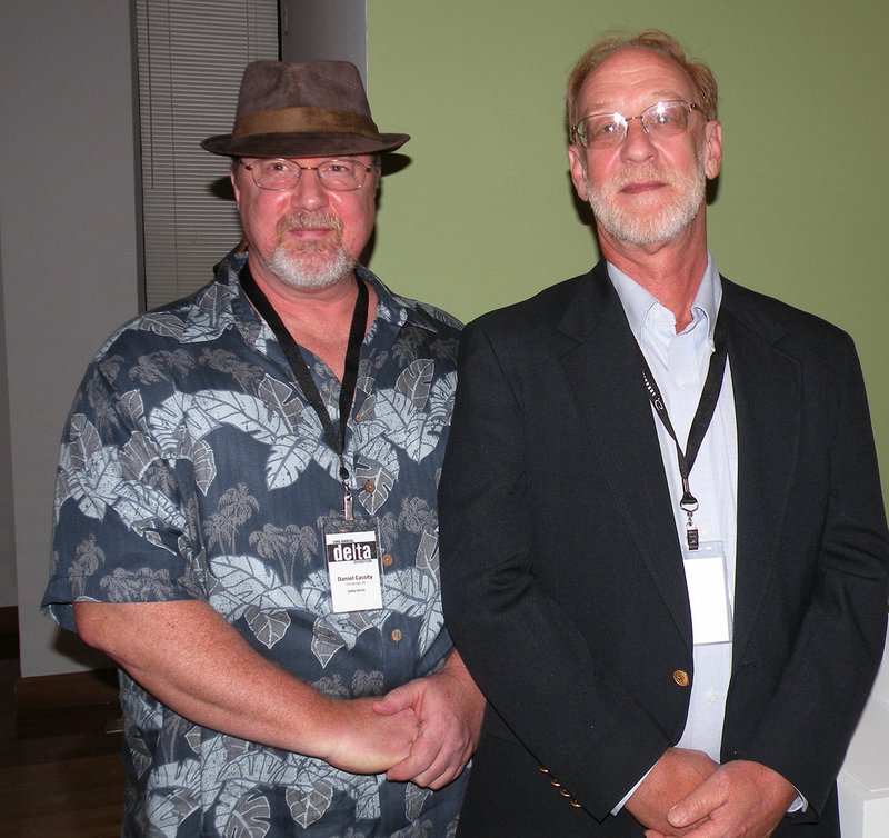 Among the artists whose works have been selected for the 59th annual Delta Exhibition at the Arkansas Arts Center are Daniel Mark Cassity, left, and Gene Sparling, both of Hot Springs. Shown at right is Sparling’s entry in the show, a wooden vessel he titled Tempest. Other local artists with works in the show are Ron Burcham of Benton and DebiLynn Fendley of Arkadelphia.
