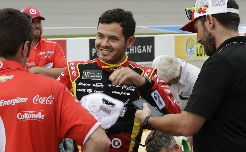 NASCAR Monster Energy Cup championship contenders Kyle Larson (shown) and Martin Truex Jr. will start on the front row in Sunday’s FireKeepers Casino 400 at Michigan International Speedway. 