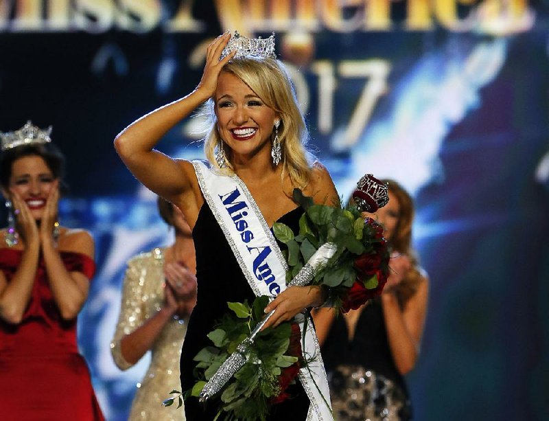 Miss Arkansa Savvy Shields reacts after being named new the Miss America 2017. Sunday, Sept. 11, 2016, in Atlantic City, N.J. (AP Photo/Noah K. Murray)