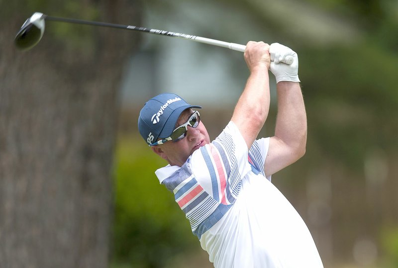 NWA Democrat-Gazette/JASON IVESTER Matt Willmott hits from the No. 7 tee box Friday during the Chick-A-Tee Tournament at Springdale Country Club.