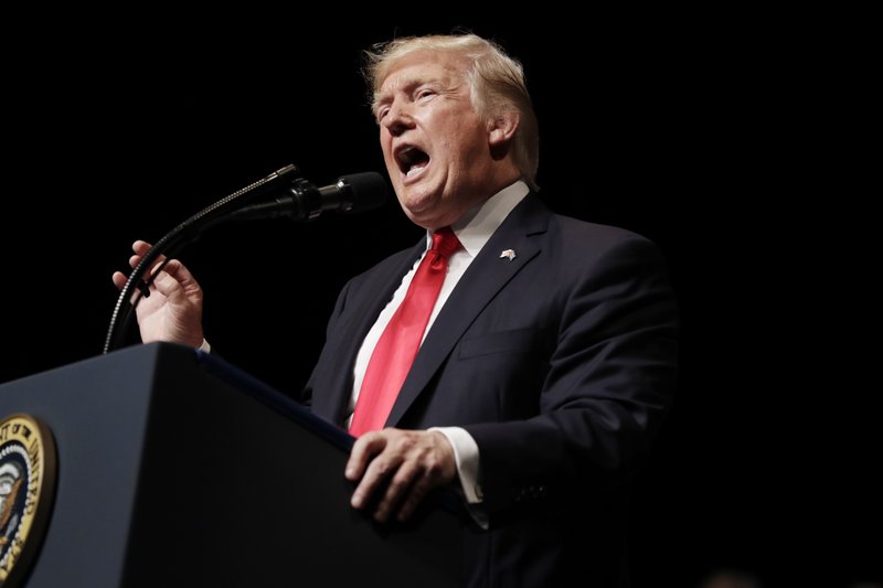 President Donald Trump speaks about Cuba policy, Friday, June 16, 2017, in Miami. The president announced changes to Obama-era Cuba policy, and challenged the Castro government to negotiate a better deal. (AP Photo/Evan Vucci)