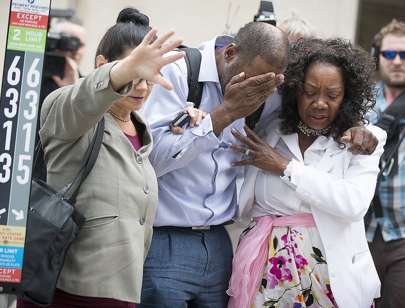 Family and friends of Valerie Castile and Philando Castile walked out of the courthouse after Jeronimo Yanez was found not guilty on all counts in the shooting death of Philando Castile, Friday, June 16, 2017, in St. Paul, St. Paul, Minn. (Elizabeth Flores/Star Tribune via AP)