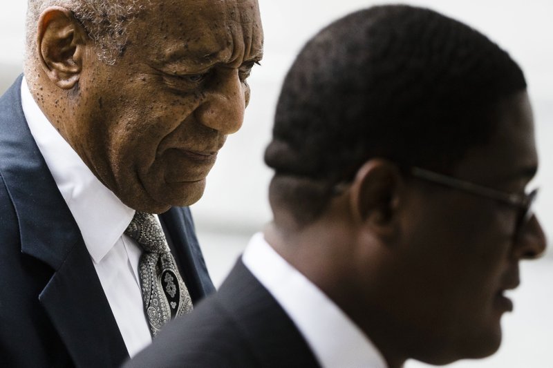 Bill Cosby, left, accompanied by Andrew Wyatt arrives for his sexual assault trial at the Montgomery County Courthouse in Norristown, Pa., Saturday, June 17, 2017. 