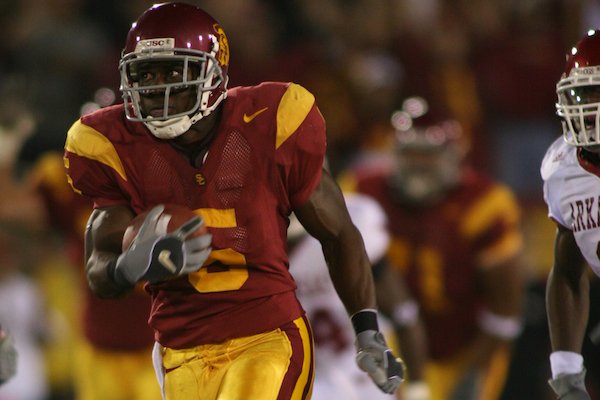 Reggie Bush scores in the first quarter of USC's 70-17 win over Arkansas on Sept. 17, 2005, at Los Angeles Memorial Coliseum in Los Angeles, Calif.