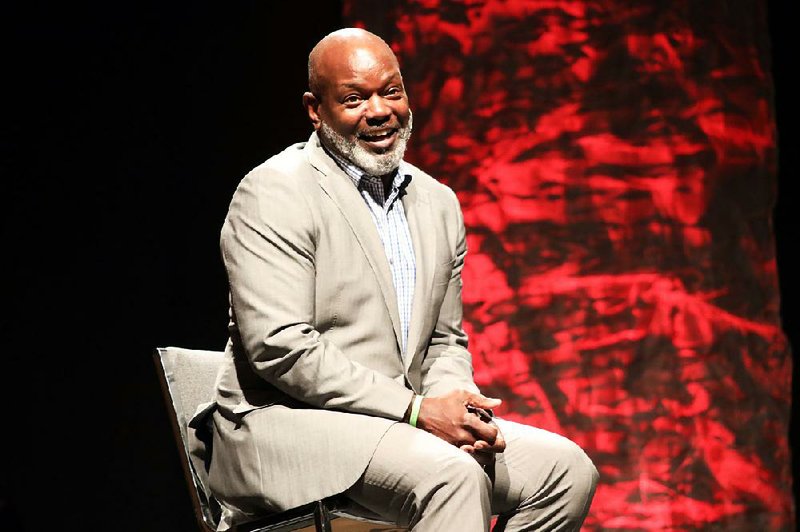 Former Dallas Cowboy Emmitt Smith speaks to high school athletes Saturday night at the All-Arkansas Preps Awards Banquet in Little Rock.