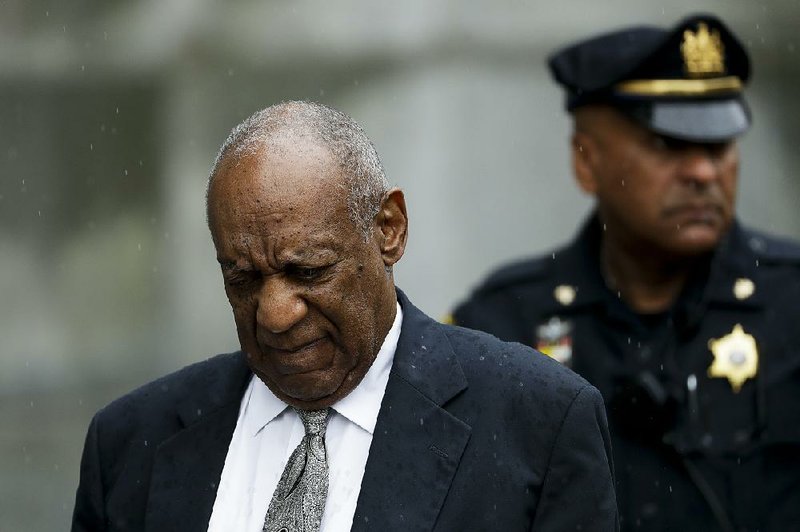 Bill Cosby leaves the Montgomery County Courthouse on Saturday in Norristown, Pa. Cosby, who remained stoic as the judge declared a mistrial, offered no comment.