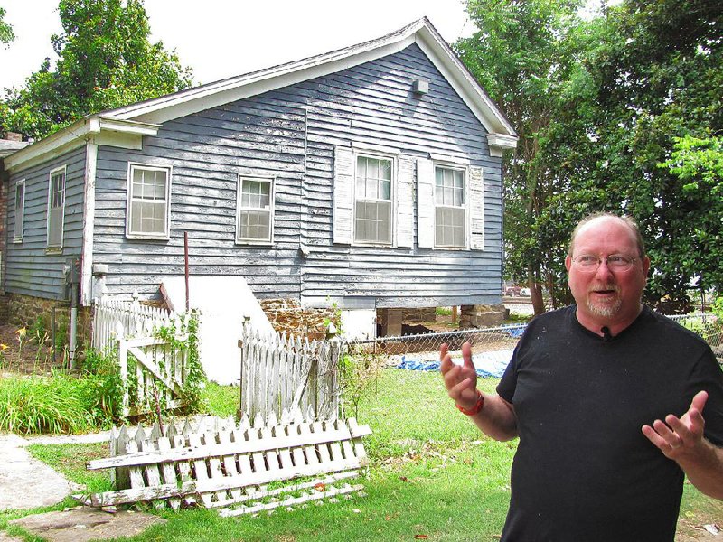 Tom Wing, an assistant history professor at the University of Arkansas at Fort Smith, describes the project to restore the Wilhaf house in Van Buren. Built in 1837, it is one of the oldest houses in the city. 