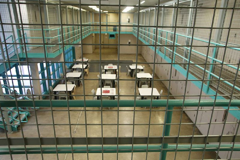 FILE — Fencing along the second floor railing in the two-story jail pods at the Pulaski County jail is shown in this 2017 file photo.