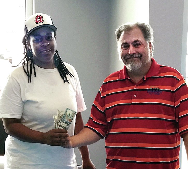 Submitted photo Gwendolyn Edwards, left, is one of three winners of the Lloyd's Lucky 333 sales event held June 1-3. Each winner received $300 by stopping in and filling out a credit application. With him is Charles Utt, a sales representative. Lloyd's Auto Sales is located at 1814 Albert Pike. For information, call 501-623-1717 or visit http://www.lloydsautosales.com.