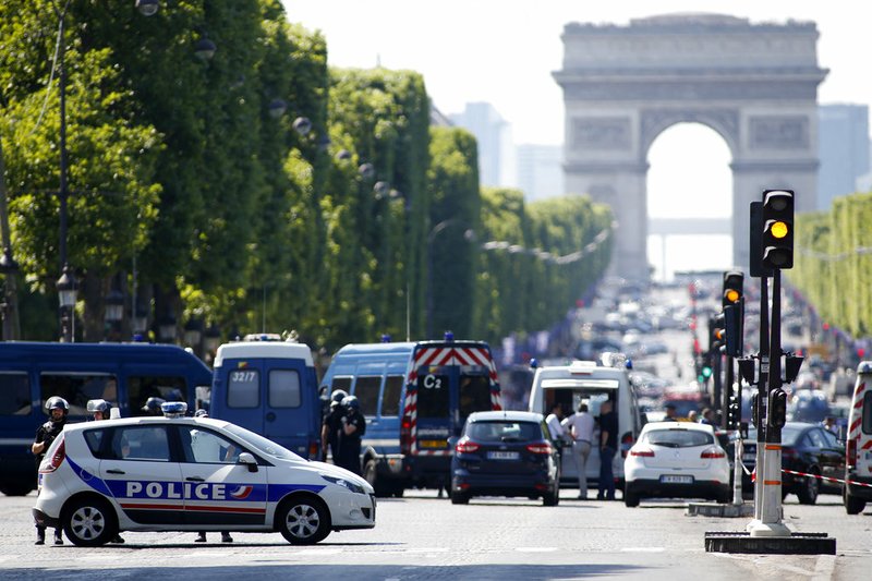 Police forces secure the area on the Champs Elysées in Paris on Monday, June 19, 2017. 