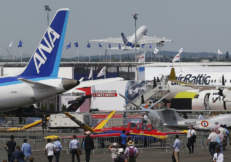 An Airbus A380 lifts off from the runway for a demonstration flight Tuesday at the Paris Air Show in Le Bourget, France, east of Paris. 