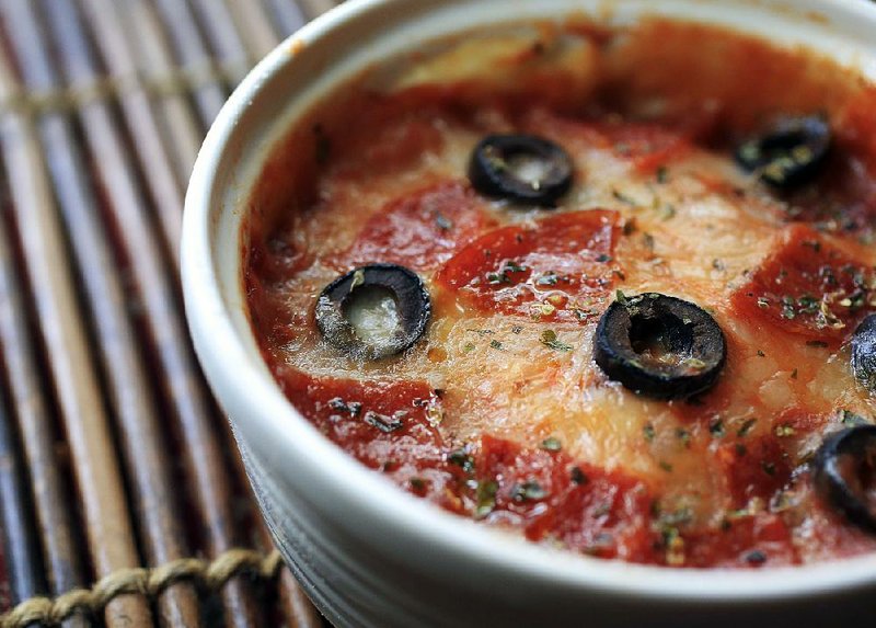 Mug Pizza topped with pepperoni and black olives is ready from start to finish in less than 5 minutes.  