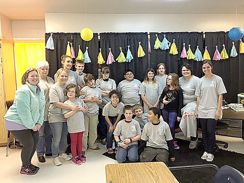 COURTESY PHOTO Students at Ledbetter Intermediate School and Lynch Middle School participated in the Area 3 Special Olympics Track Event this spring in Fayetteville. They had a big send-off from Ledbetter classmates before the competition.