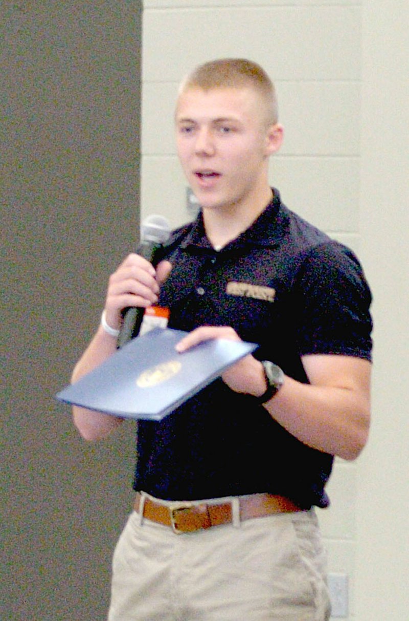 MARK HUMPHREY ENTERPRISE-LEADER/Zeke Laird, a 2017 Prairie Grove graduate, gets practice with public speaking during a picnic hosted Saturday at Bentonville by Congressman Steve Womack as a sendoff for appointees to military academies. Laird will attend West Point.