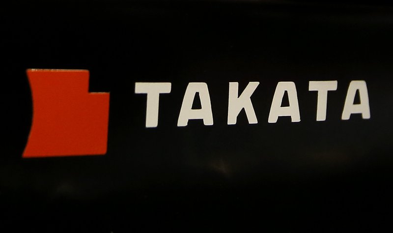 FILE - This July 6, 2016, file photo, shows the logo of Takata Corp. at an auto supply shop in Tokyo.  (AP Photo/Shizuo Kambayashi, File)