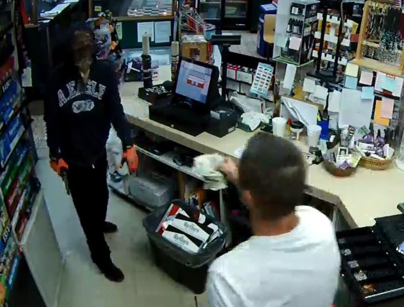 Surveillance footage of a gunman who police say robbed a Clarksville convenience store Wednesday morning