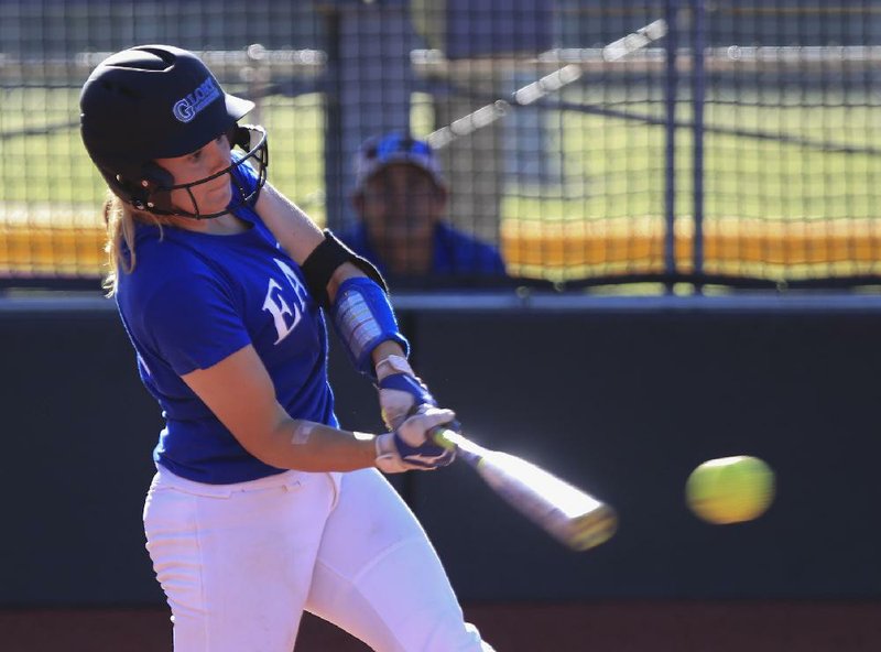 East batter Hannah Fisher hits the ball Tuesday in the first game of the All Star softball double header in Conway. 