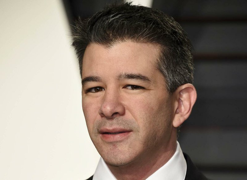  In this Sunday, Feb. 26, 2017, file photo, Uber CEO Travis Kalanick arrives at the Vanity Fair Oscar Party in Beverly Hills, Calif.